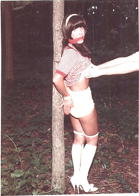 24P Retro bondage-stripped in the forest.