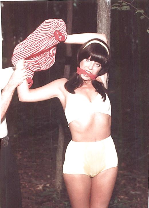 24P Retro bondage-stripped in the forest.