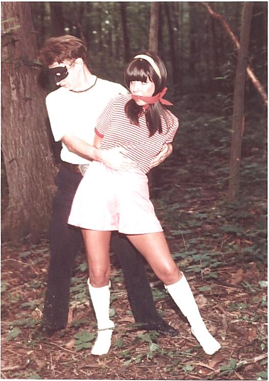 24P Retro bondage-stripped in the forest.