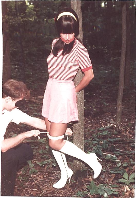 24P Retro bondage-stripped in the forest.