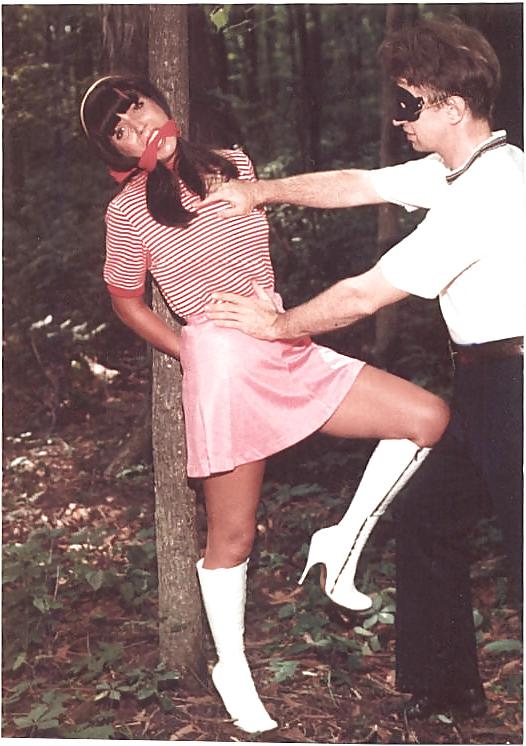 24P Retro bondage-stripped in the forest.