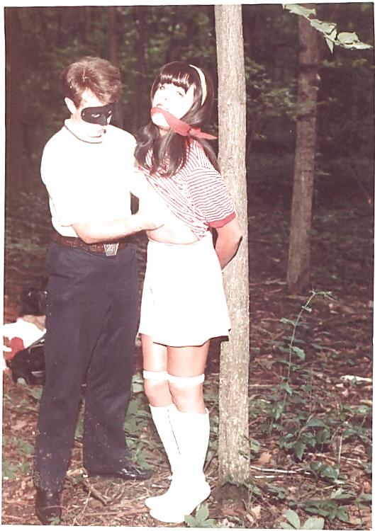 24P Retro bondage-stripped in the forest.