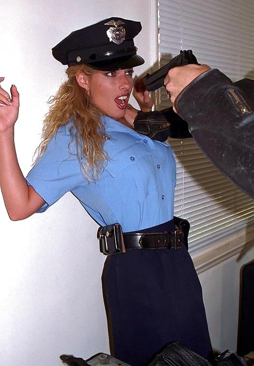 16P Pantyhose babe in trouble-the rookie cop.