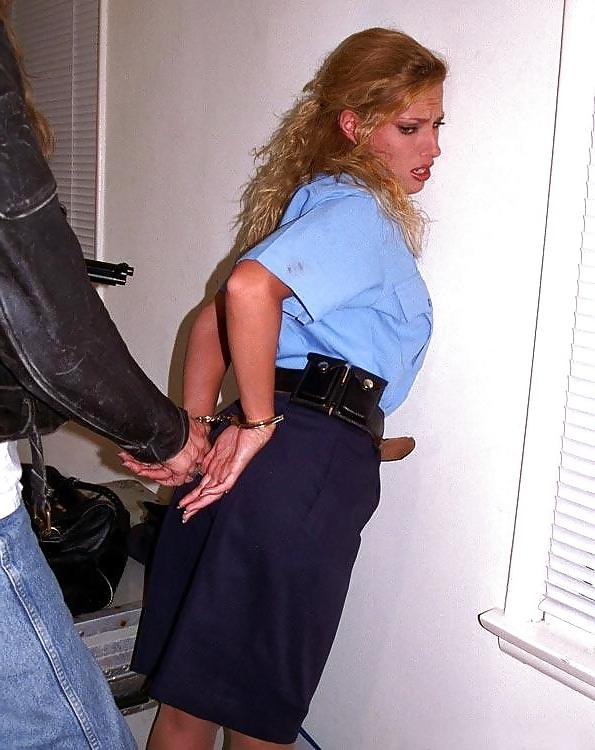 16P Pantyhose babe in trouble-the rookie cop.