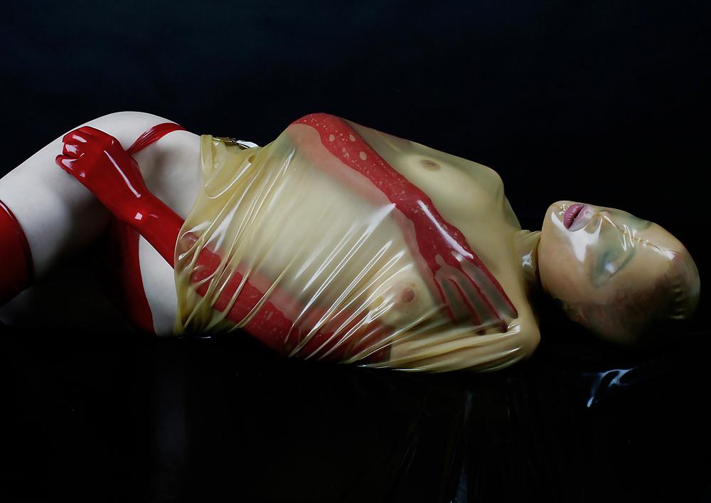 25P Latex Fetish Redhead 