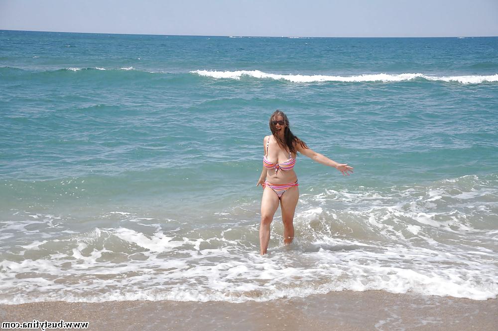 13P Busty Tina - On the beach