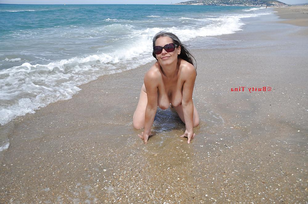 13P Busty Tina - On the beach