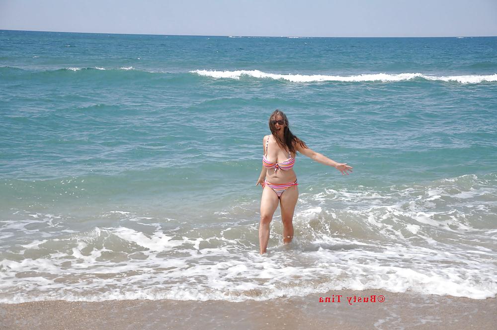 13P Busty Tina - On the beach