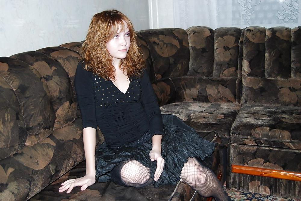 21P A tiny sweet teen poses hot and sexy at home