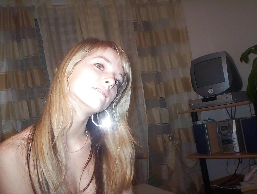 25P Sweet blonde posing at home