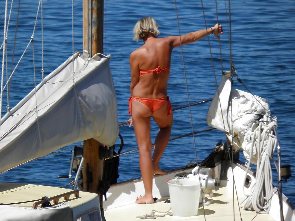 16P Sexy ass Italian bikini granny on the boat