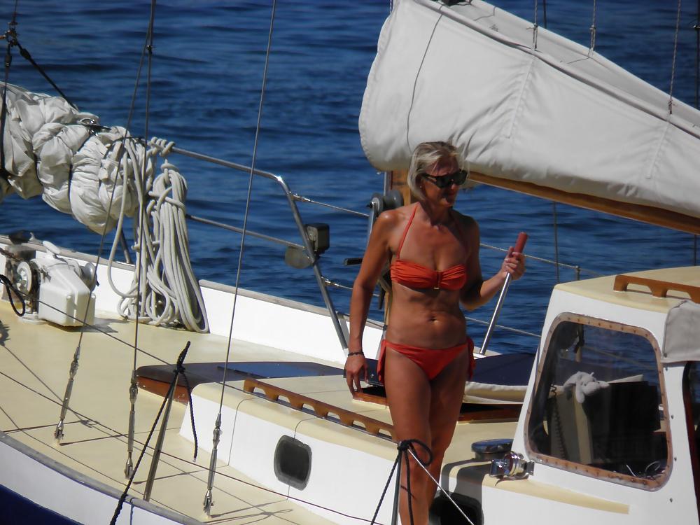 16P Sexy ass Italian bikini granny on the boat