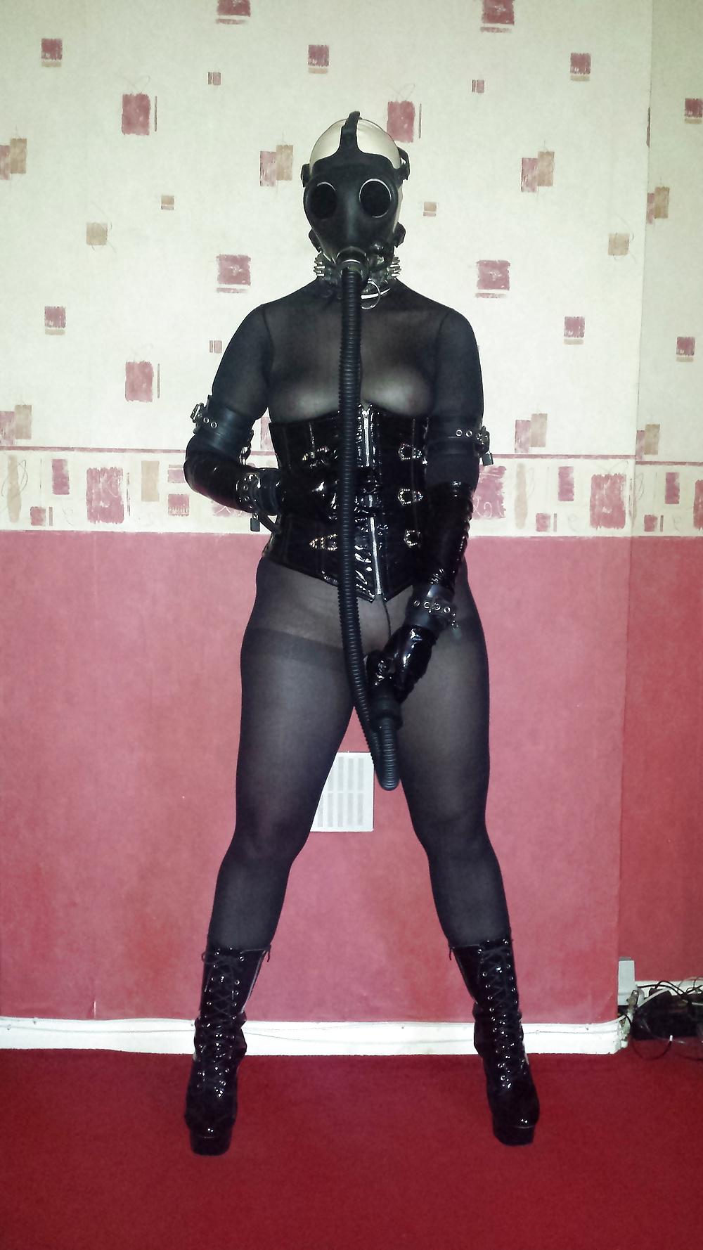 8P Slave girl in rubber gas mask and dildo hose