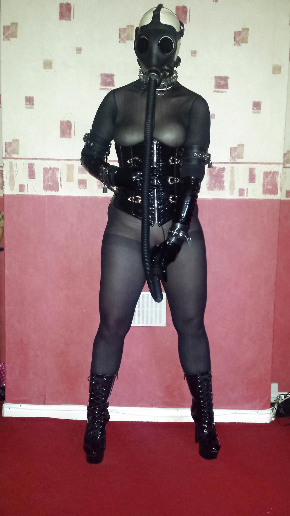 8P Slave girl in rubber gas mask and dildo hose