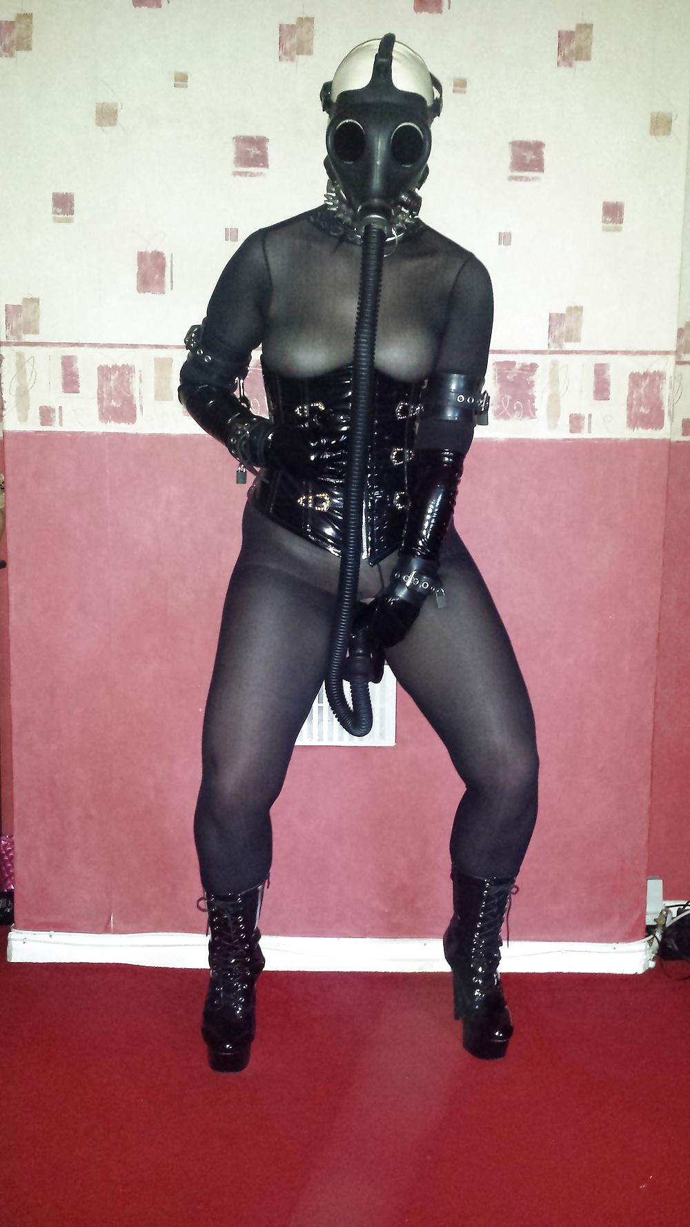 8P Slave girl in rubber gas mask and dildo hose
