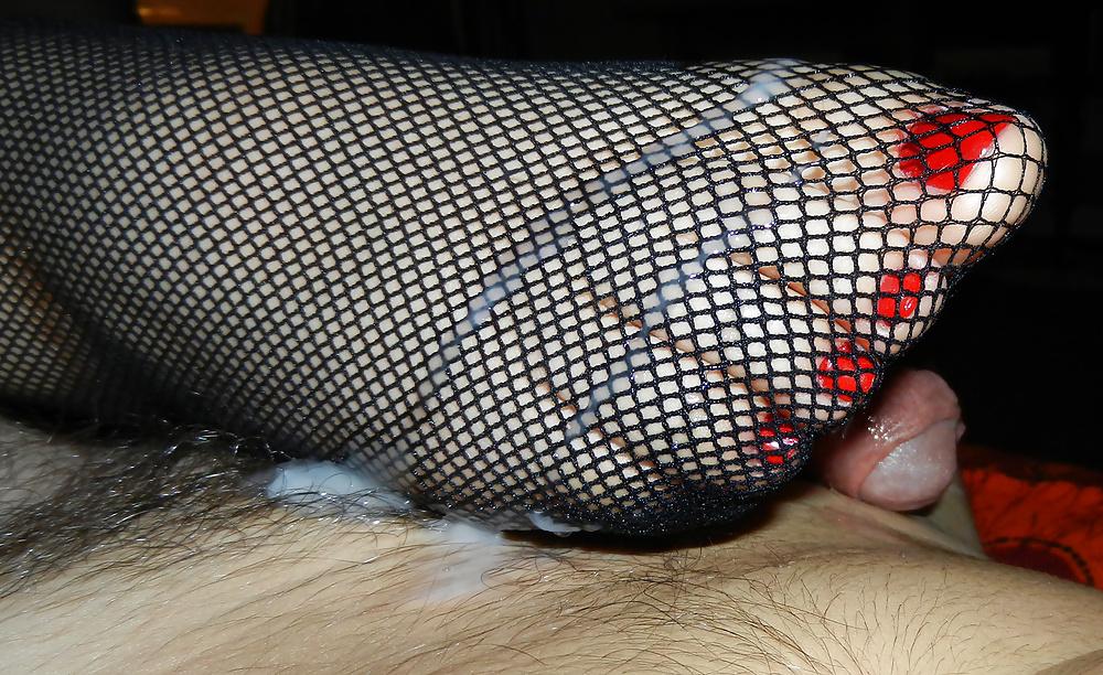 23P Fishnet stockings footjob 2