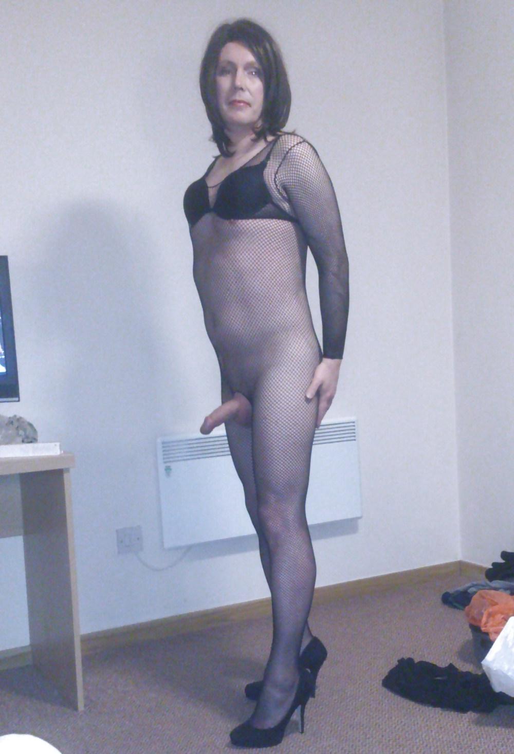 15P Slut Emma in black fishnet bodystocking exposing herself