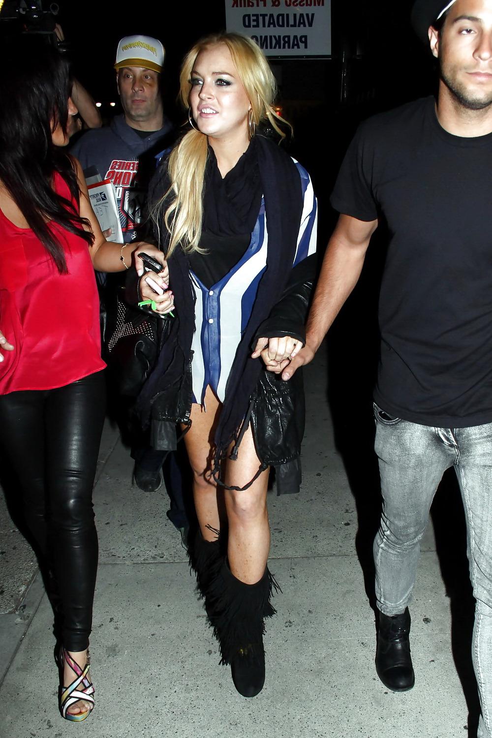 15P Lindsay Lohan leaves her hollywood home in a sexy mini-skirt