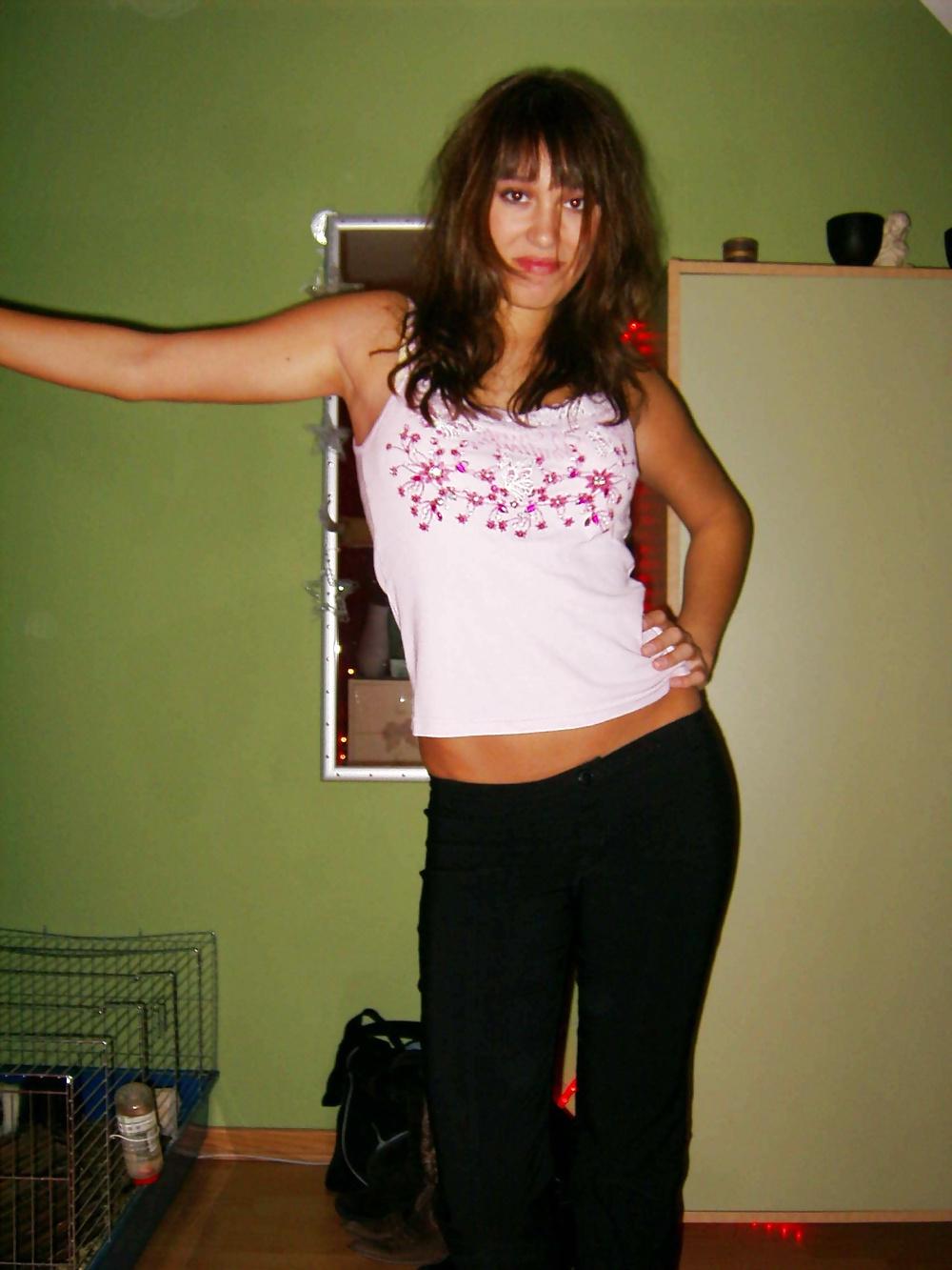 25P Brunette teen posing at home