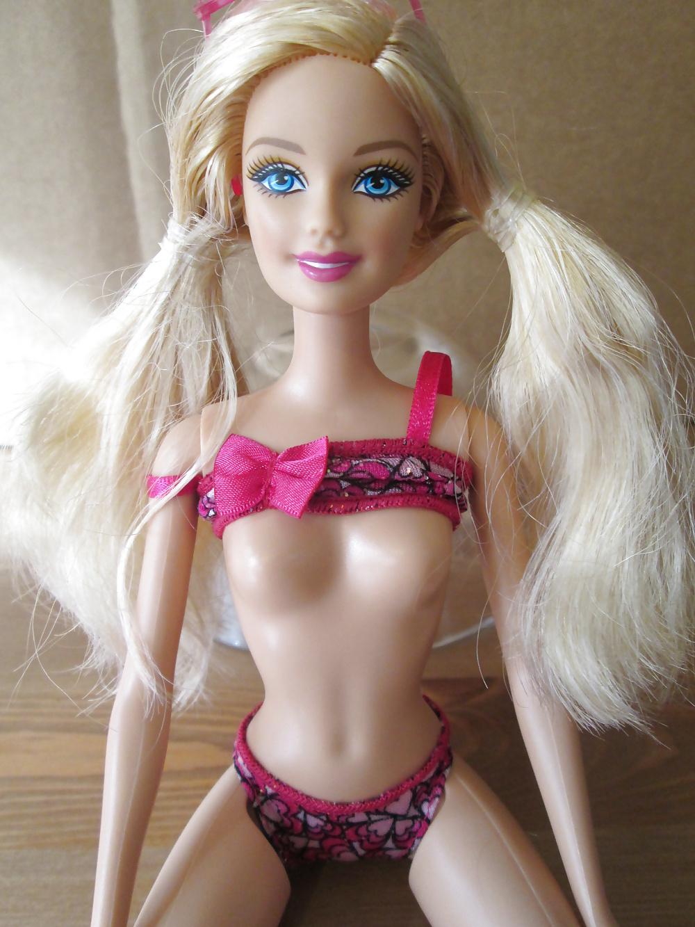 25P Blond bikini doll cumshot