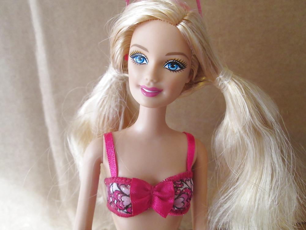 25P Blond bikini doll cumshot