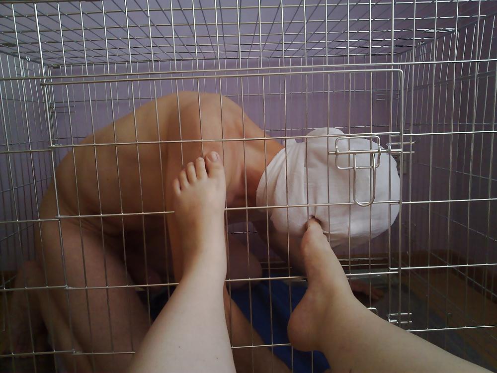 11P Slave in cage