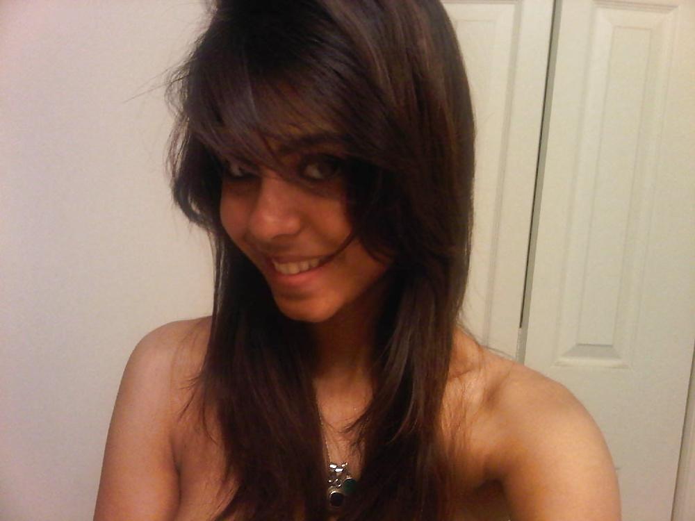 25P Arabic beautiful girl shows her body