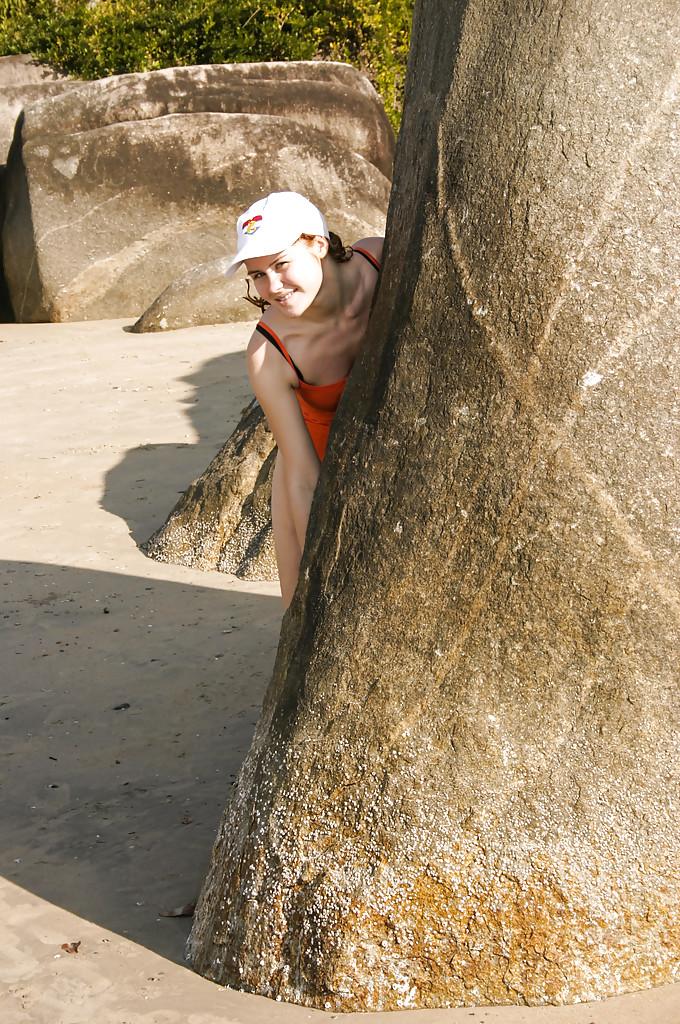 16P Hot babe Yvette B teases her teen pussy on a beach while in tight panties
