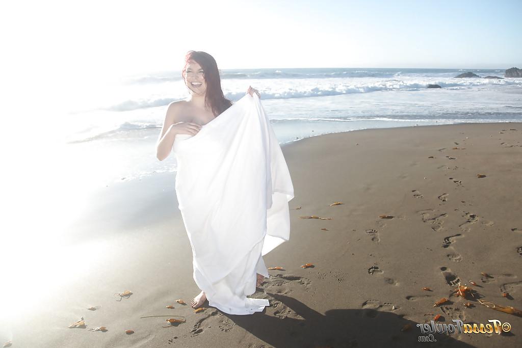 16P Buxom pornstar Tessa Fowler modeling topless outdoors on beach