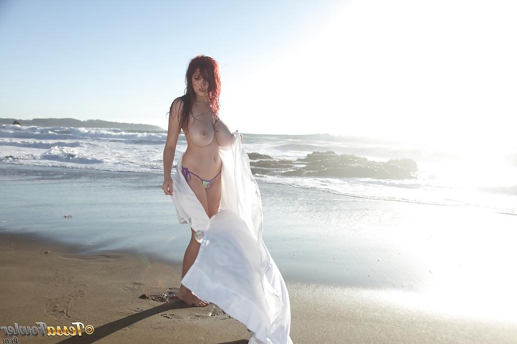 16P Buxom pornstar Tessa Fowler modeling topless outdoors on beach