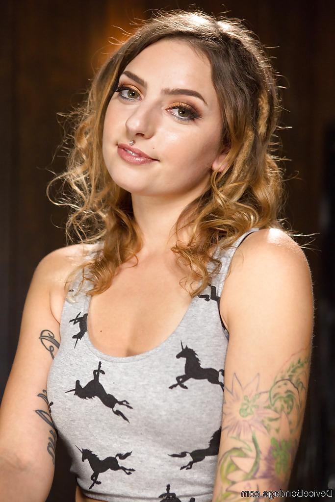 16P Fully clothed model Missy Minks is placed in stocks before torture session