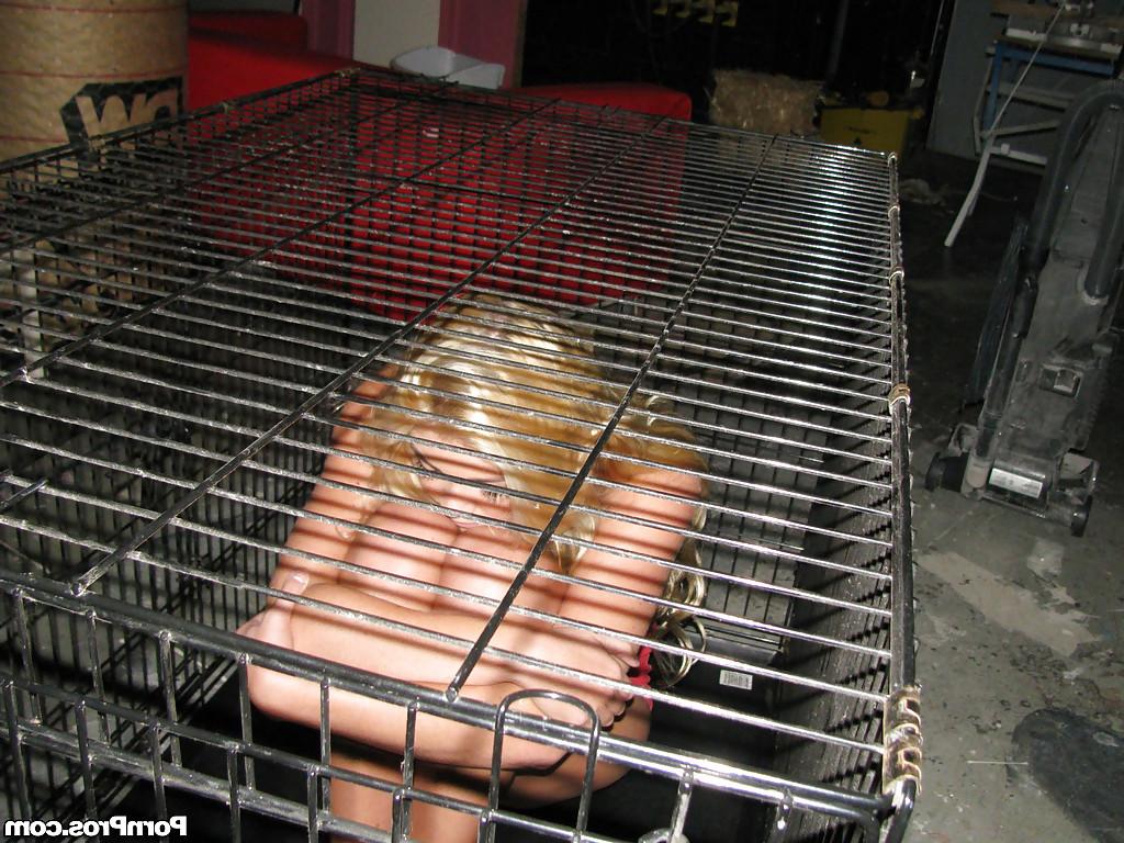 15P Amateur babe Jessie Andrews is imprisoned in her socks, in a cage