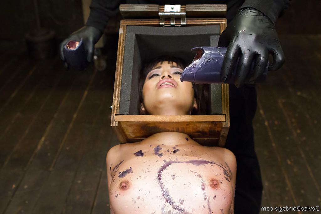 16P Asian bondage babe Milcah Halili is covered in hot wax while restrained