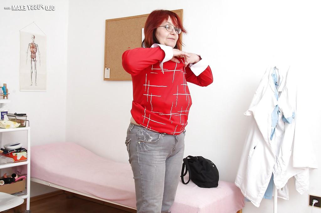 14P Chubby granny with flabby jugs stripping in the gyno office