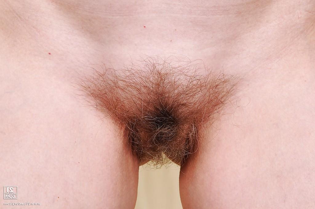 16P Granny takes off her panties to show her hairy pussy in stockings