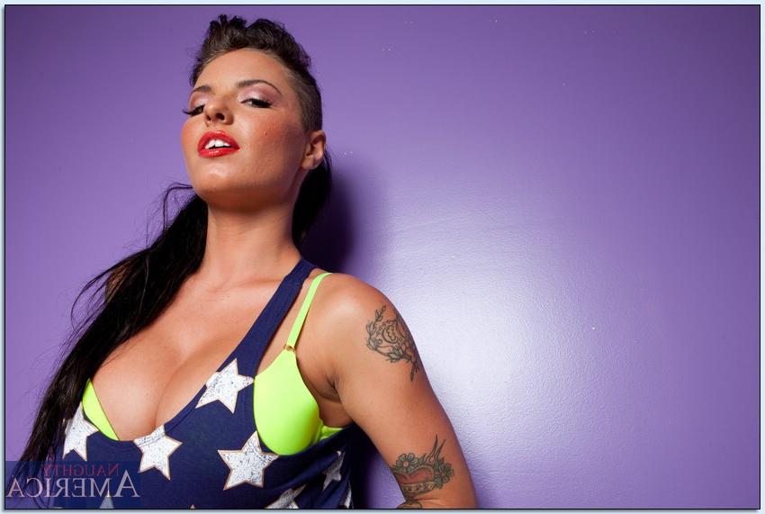 16P Busty tattooed teen babe Christy Mack stripping off her clothes