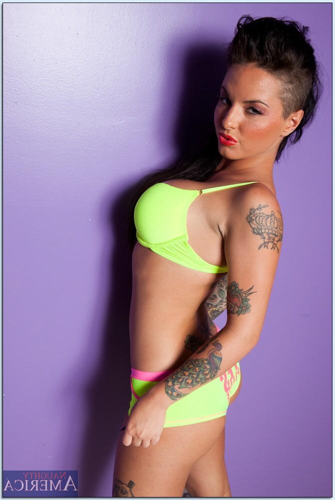 16P Busty tattooed teen babe Christy Mack stripping off her clothes