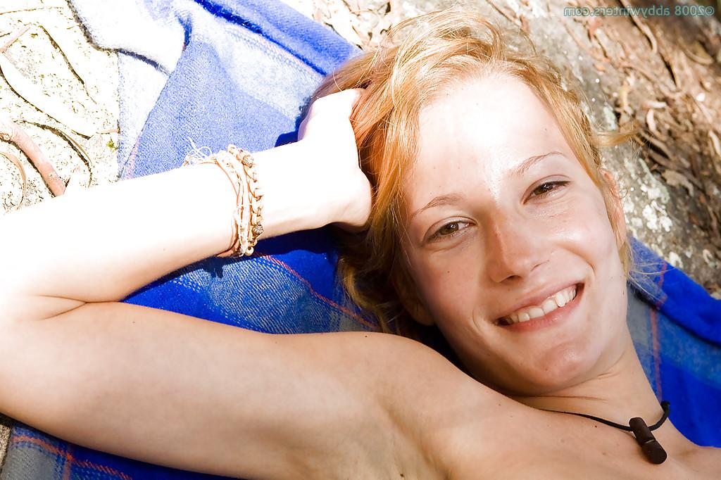 16P Redhead first timer Chanel flashes white panties from under skirt outdoors
