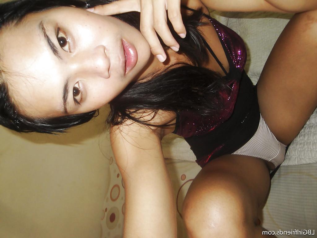 16P Gorgeous Thai shemale June bares naked teen body outdoors on the beach