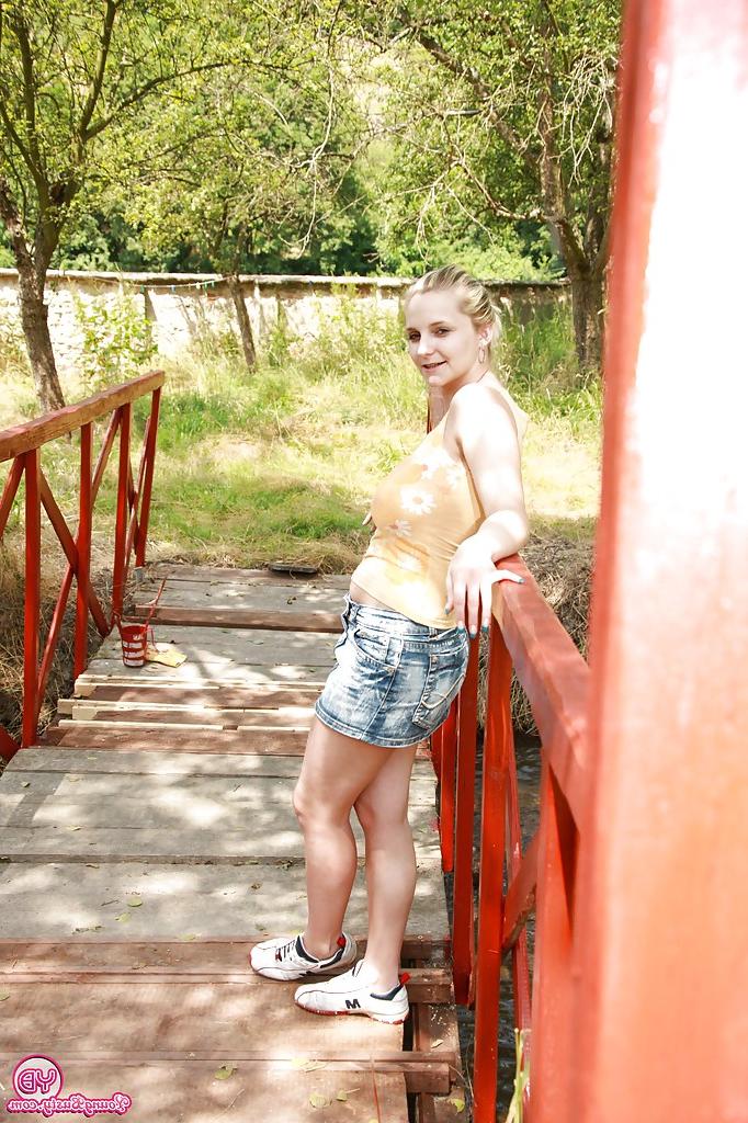 16P Joanna fingering shaved pussy on the bridge and having lots of fun