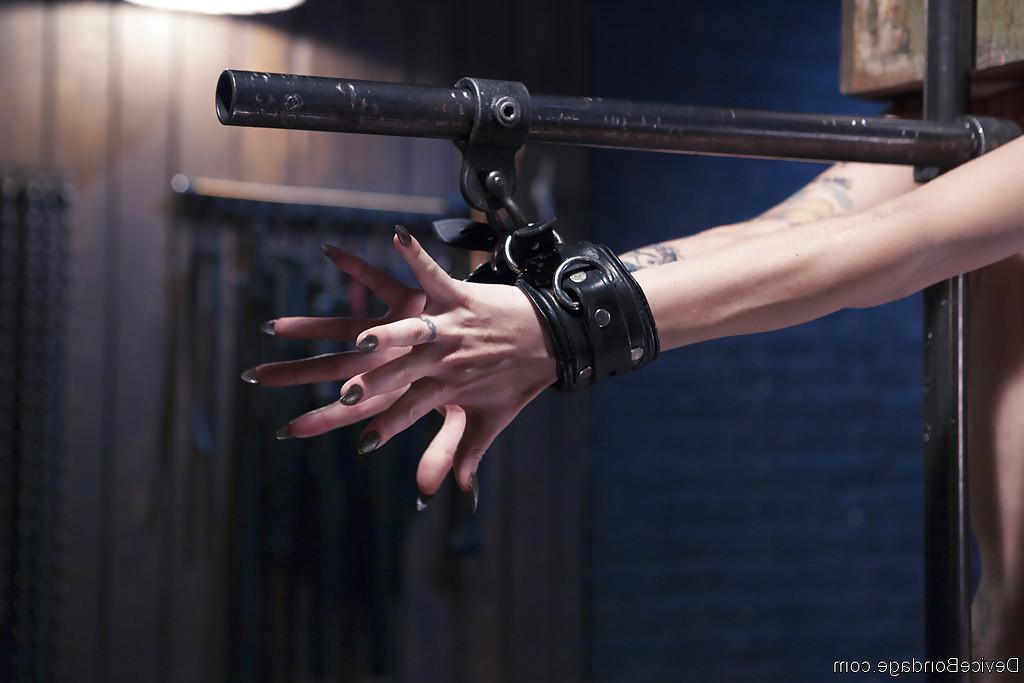 16P Tattooed blonde Jeze Belle getting flogged with bondage box on head