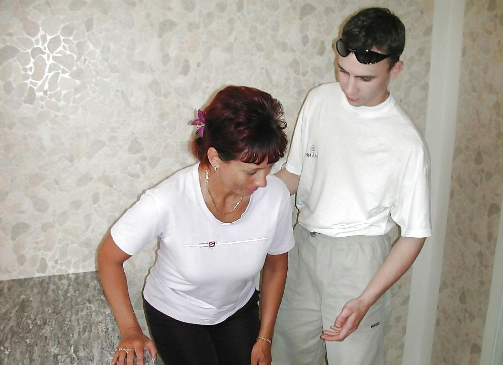 25P Russian mom Amalia with her son in the kitchen
