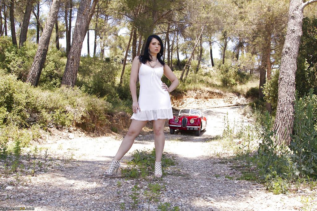 16P Stunning babe Angell Summers slipping off her dress and panties outdoor