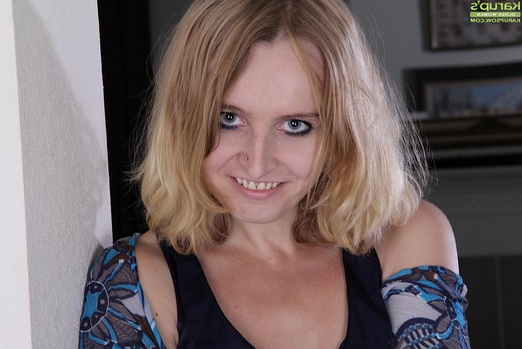 16P Older blonde dame Annabelle pulling pink panties down to expose shaved cunt