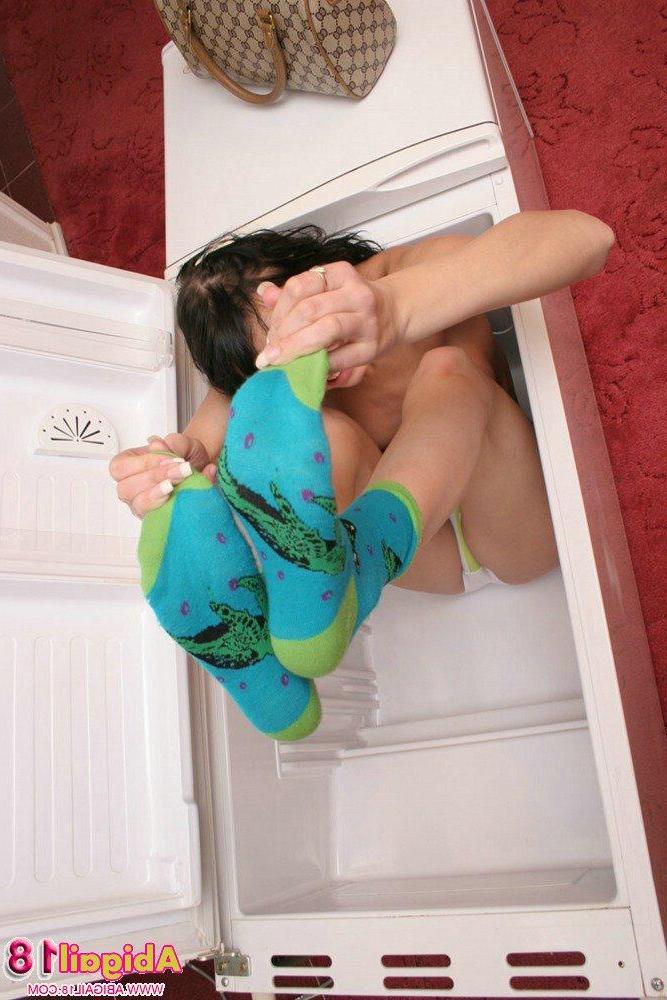 15P Abigail strips out of her panties in the kitchen