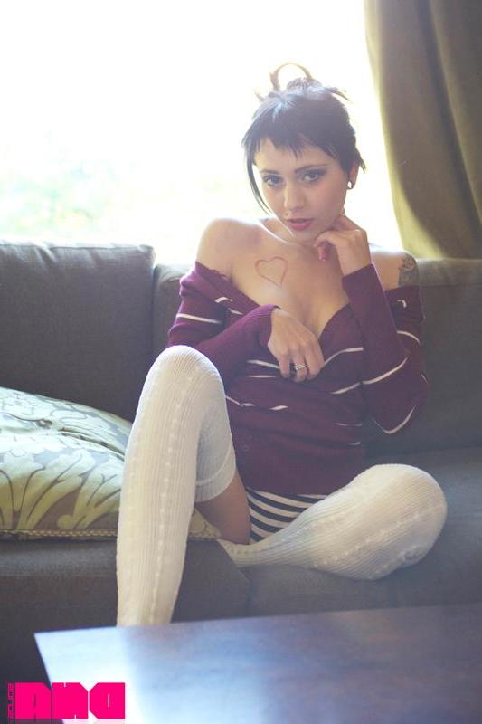 15P Hot pinup Adora teases in her stockings on the couch