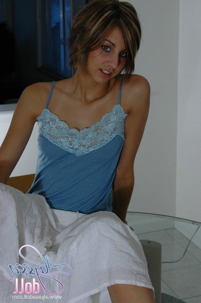 16P Pictures of Alyssa Doll taking off her shirt