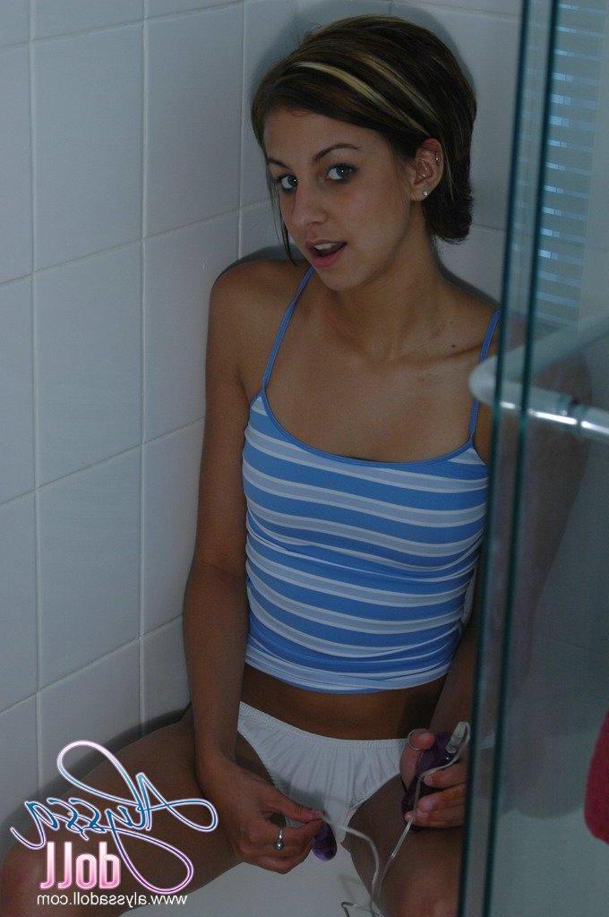 16P Pictures of Alyssa Doll pleasuring her pussy with a toy