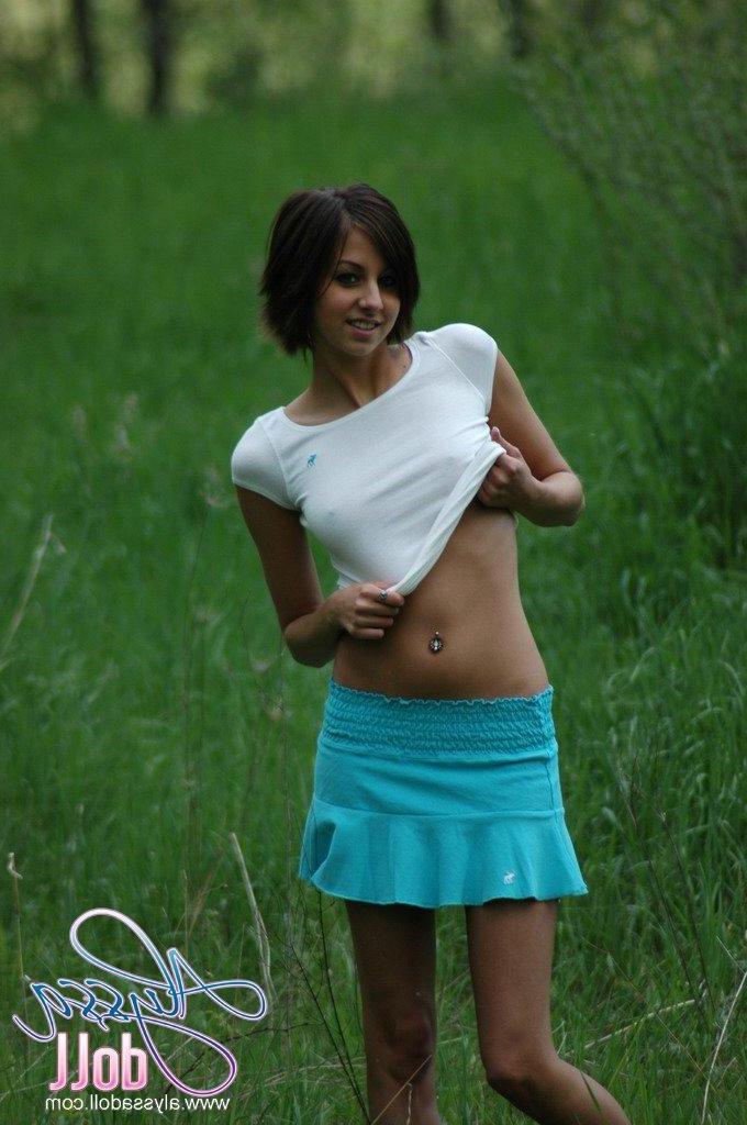 15P Alyssa strips off her clothes in a wide open field