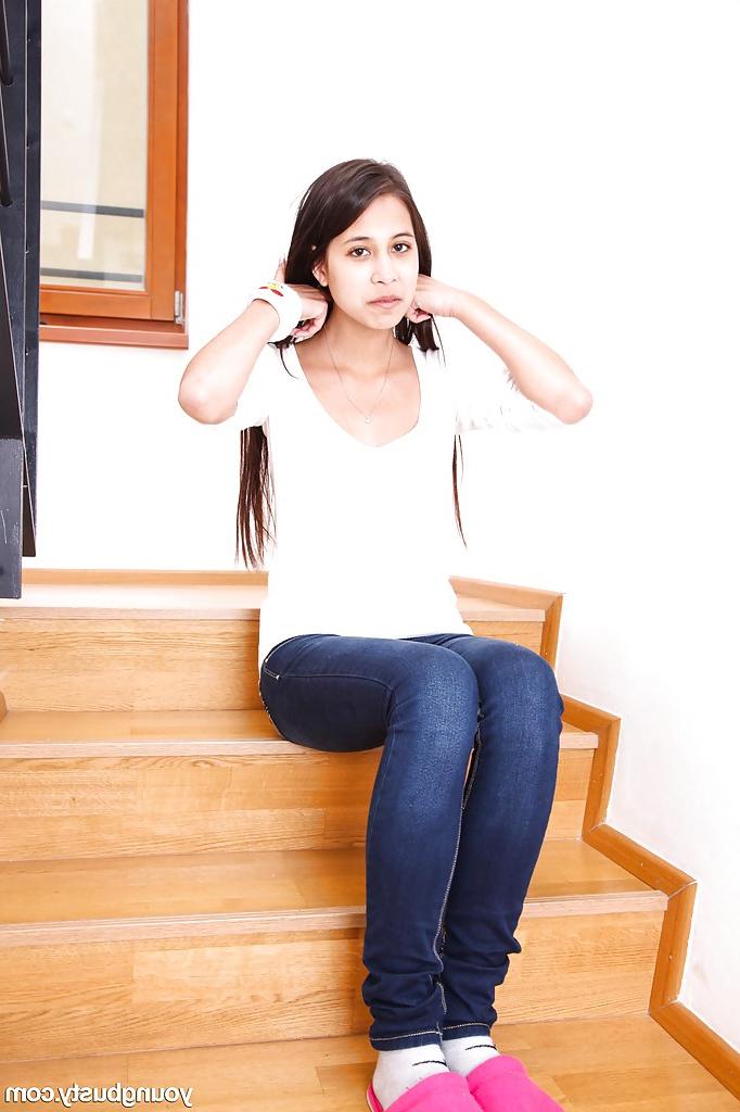 15P Busty European brunette teen babe Paula O removing jeans and panties